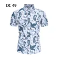 Detail view of men's short sleeve summer shirt with intricate blue paisley floral print pattern. - DC49 White