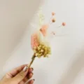 Detail shot of mini dried flower bouquet with pink and white bunny tails and twine wrap. - XH206