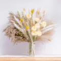 Dried pampas grass bouquet with bunny tails and artificial flowers in glass vase for home decor - HS90