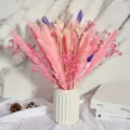 Colorful dried flower bouquet with bunny tails and reed grass in white ceramic vase. - HS193