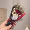 Mini dried flower bouquet with red roses and baby's breath for gifts and home decor. - Red Rose with Red-Black Paper Mini