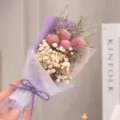 Mini dried flower bouquet with purple wrapping and white mesh, perfect gift for friends. - Strawberry Fruit Flower with Purple Paper Mini