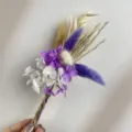 Detailed shot of dried flower bouquet with purple white hydrangea and bunny tails grass. - XH35