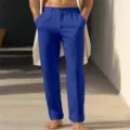 Detail view of men's casual royal blue straight leg linen trousers with slant pockets. - Blue
