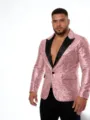 Vista detallada del blazer de lentejuelas rosas con solapas negras clásicas y un solo botón. - Rosa