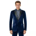 Detail view of a men's blue velvet blazer featuring satin lapels and a patterned inner shirt. - S / Blue