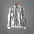 Shiny silver metallic finish jacket detail showcasing the front zipper and white ribbed cuffs. - M / Y66 Silver