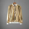 Men's shiny gold bomber jacket detail, metallic glossy fabric with white ribbed cuffs and hem. - M / Y66 Gold
