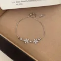 Silver adjustable flower bracelet with sparkling zircon stones, elegant daily wrist jewelry. - TSW6 Five-Petal Flower Bracelet