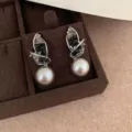 Elegant silver pearl earrings featuring sparkling black and clear crystals in wing design for women. - Black Crystal Leaf Pearl Pendant (ZG3)