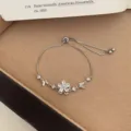 Silver flower and butterfly zircon adjustable bracelet, delicate daily stacking fashion jewelry item. - TSW36 Five-Petal Flower Charm Bracelet