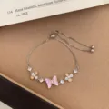Silver adjustable bracelet with pink butterfly and sparkling cubic zirconia for daily chic wear. - TSW51 Pink Butterfly Bracelet