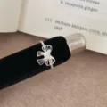 Anillo abierto de lazo plateado estilo coreano con cristal brillante, joya elegante. - Lazo de Mariposa Blanca