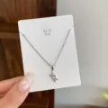 Dainty silver star pendant necklace with sparkling rhinestones, minimalist daily jewelry. - TXL99 Rhinestone Double Four Pointed Star Necklace