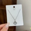 Elegant four-leaf clover silver necklace with sparkling cubic zirconia, minimalist. - Hollow Clover Necklace