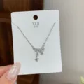 Silver bow star pendant necklace dainty clavicle chain minimalist everyday jewelry accessory - Bowknot Four Pointed Star Pendant Necklace