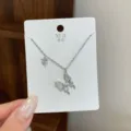 Silver butterfly and heart rhinestone delicate necklace, minimalist daily commute jewelry accessory. - Hollow Butterfly Heart Necklace