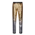 Detailansicht der goldenen Glitzerhose mit feinen Pailletten und schwarzem Bundrand. - S / Gold und Silber