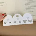 Silver zircon earring set featuring delicate butterfly and clover studs for women jewelry gift. - Butterfly Star / Silver