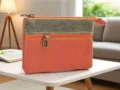 Borsetta portamonete compatta in tela multistrato con elegante contrasto di tessuti e zip. - Arancione Moda
