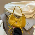 Gelbe Umhängetasche mit Schleife und Herzanhänger, stylische lässige Damen Handtasche chic. - Gelb