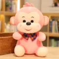 Cute pink plush monkey toy with a stylish bow tie, soft stuffed doll gift for children. - Bowtie Monkey / 20cm / Pink