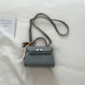 Elegant grey womens top handle shoulder bag stylish crossbody handbag with lock closure. - With Pendant / Blue