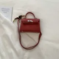 Retro leather top handle crossbody bag with metal lock, chic square handbag for women. - With Pendant / Red