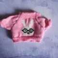 Pink knitted doll sweater featuring cute bunny pattern with glasses, ideal for cute plush toy styling. - Pink Rabbit Style Sweater