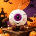 Pendant peluche œil d'Halloween, jolie poupée en peluche porte-clés pour sacs et cadeaux. - Violet