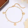 Close-up of gold stainless steel anklet with hollow star charms and sparkling diamond stones. - Pentagram