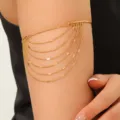 Bracciale da braccio a catena multistrato in oro da donna, elegante gioiello boho chic. - Stile Catena Soldi / Oro