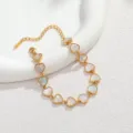 Vergoldetes Herz Perlmutt Armband Damen Luxus schick elegant Modeschmuck Accessoire. - Herz / Weiß