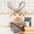Cute plush pig toy wearing a grey knitted sweater, rabbit ear headband, and glasses. - Gray Sweater Style