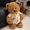 Cute brown plush teddy bear doll wearing cute pajama set, ideal sleeping companion gift. - Pajama Bear