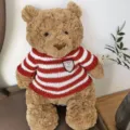 Cute brown plush teddy bear wearing a cozy red and white striped knitted sweater doll clothes. - Suitable for 28cm Bear (Excluding Doll) / Red Striped Sweater
