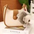 Cute plush animal keychain charm with stylish color-block PU leather shoulder bag decor. - Grey Dolphin Pendant / 10cm