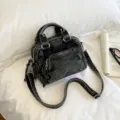 Stylish denim Boston bag with top handles and crossbody strap, perfect for daily commuting. - 20x10x16cm / Black (Without Pendant)