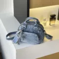 Blue denim Boston handbag with star pendant and pearl strap, stylish shoulder crossbody bag. - Light Blue With Charm