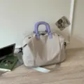 Large capacity solid color travel handbag and crossbody bag with stylish purple handles. - Gray