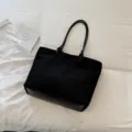 Black minimalist canvas tote bag with shoulder straps and PU leather base for women daily use - No Pendant / Black