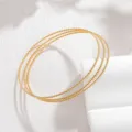 Minimalistisches goldfarbenes dreilagiges verdrehtes Metall Armband für Damen schicker Schmuck - JZB1250 Einzelner Ring / Gold