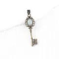Vintage antique bronze key pendant necklace with oval gray stone, elegant palace style charm. - Aquamarine (Bronze Color)