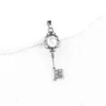 Vintage style key pendant with natural white stone inlay, elegant silver metal necklace accessory. - White Turquoise (Antique Silver)