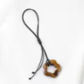 Bruine steen bloem hanger met zwart koord DIY ketting sieraden maken accessoire mooi - Tijgeroog