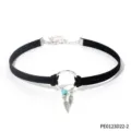 Black velvet choker necklace with silver metal ring turquoise bead and feather pendant. - Black