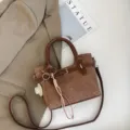 Retro brown textured women handbag crossbody bag with chic decorative pendant and strap. - Light Coffee