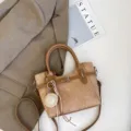 Vintage contrast color women shoulder handbag with straw hat pendant and stylish belt decor. - Khaki