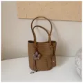 Chic brown woven leather bucket bag with top handle and coin pouch for women daily commute. - With Charm / Khaki