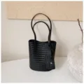 Black woven leather bucket bag with double handles and small pouch for daily commute style. - No Pendant / Black
